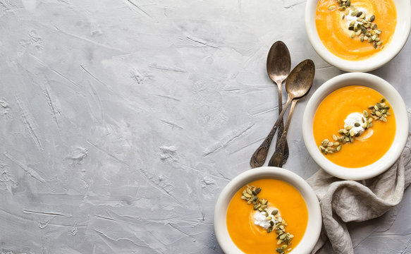 Squash soup on gray concrete background