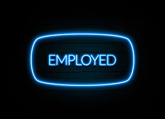 Employed  - colorful Neon Sign on brickwall