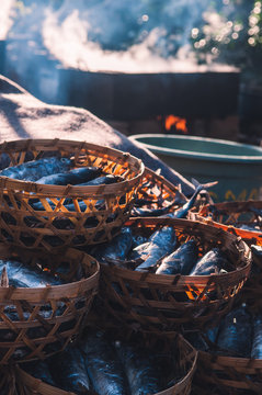 Salted fish drying in basket