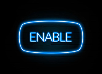 Enable  - colorful Neon Sign on brickwall