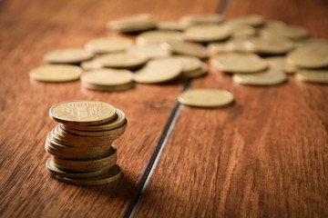 coins on wooden tables on stack 