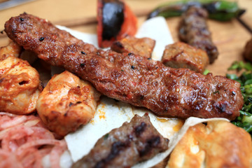Various kebab on pitta bread