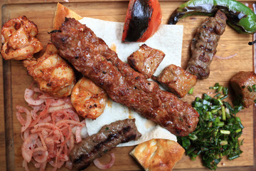 Various kebab on plate