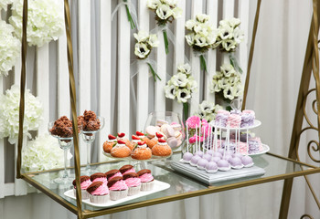 Tasty desserts on table for wedding