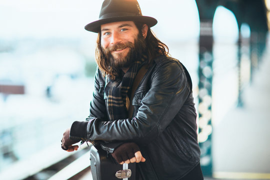 Happy commuter waits for the NYC subway
