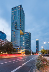 Fototapeta na wymiar Warsaw, capital of Poland, modern skyscrapers on Emilii Plater street in the evening