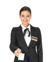 Female hotel receptionist with card on white background