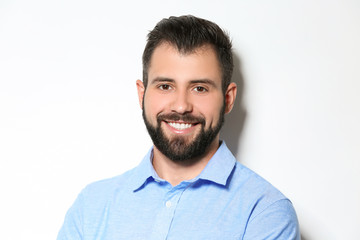 Obraz premium Handsome man on light background