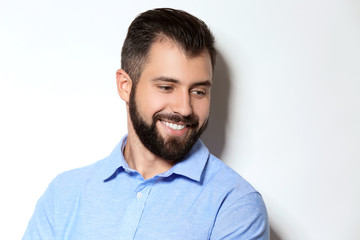 Obraz premium Handsome man on light background