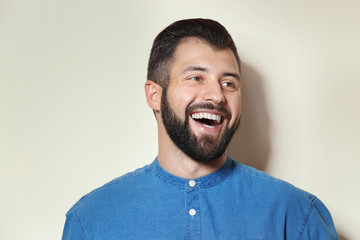 Fototapeta premium Handsome man on light background