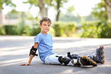 Cute roller skater in park © Africa Studio