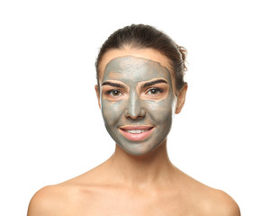 Young woman with facial mask on white background