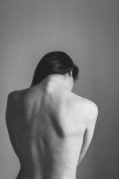 Nude woman rear view