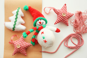 Christmas composition with soft toys on white background