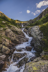 Fototapeta na wymiar Mountain waterfall. Caucasus, Karachai-Cherkess Republic