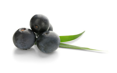 Fresh acai berries, isolated on white