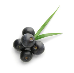 Fresh acai berries, isolated on white