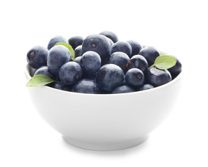 Bowl with fresh acai berries, isolated on white