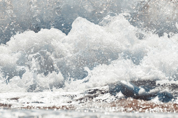The big wave on the sea with a lot of foam. Dramatic sea