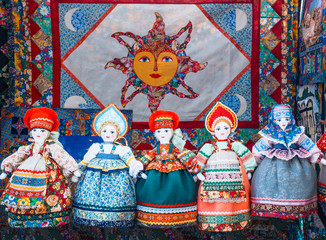 Slavic rag doll. Handmade rag doll woman, in traditional ethnic russian costume. Souvenirs from Russia