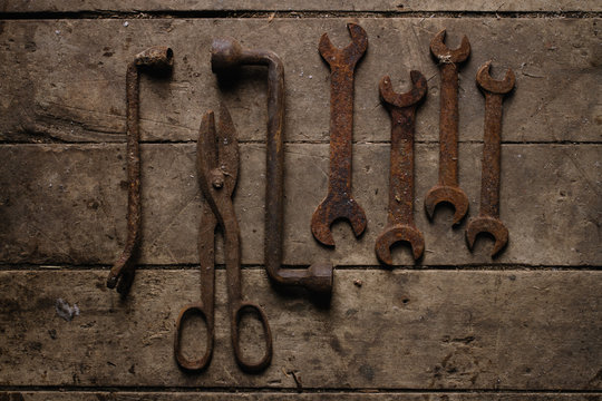 Vintage tools hammer nails and wrenches