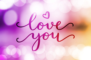 love you, vector lettering on blurred lights background, valentine card template