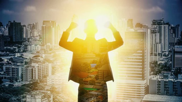Businessman happy and looking Bangkok cityscape. Double exposure.
