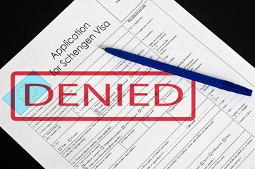 paper blank form Schengen visa with the stamp denied