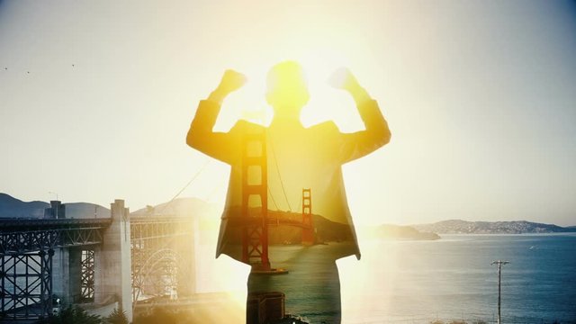 Businessman happy looking Golden Bridge San Francisco cityscape. Double exposure