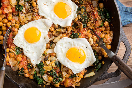 Spinach With Chickpeas And Fried Eggs