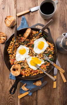Spinach With Chickpeas And Fried Eggs