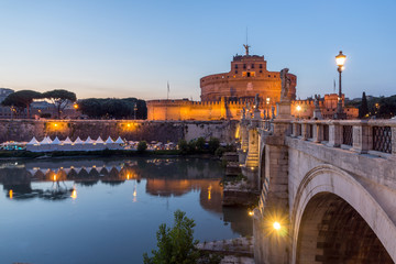 ROME, ITALY - JUNE 22, 2017: Amazing Sunset view of St. Angelo Bridge and castle st. Angelo in city of Rome, Italy