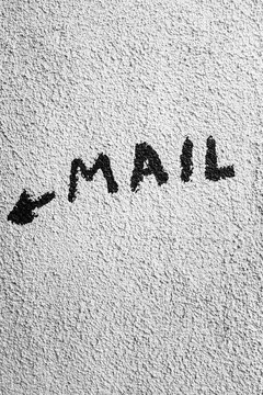 The word MAIL" and small arrow written on stucco wall of house""he word "MAIL" and small arrow written on stucco wall""e word "MAIL" and small arrow written on stu"" word "MAIL" and small arrow written""word "MAIL" and small arrow w""ord "MAIL" and small ar""rd "MAIL" and smal""d "MAIL" and s"" "MAIL" and"""MAIL" an""MAIL" an""AIL"