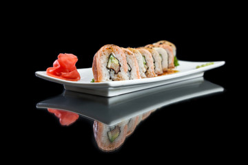 sushi roll on black