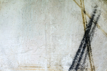 Old concrete wall with painted black and yellow lines pattern texture and background