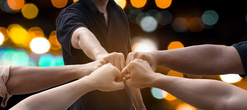 Teamwork Join fist Support Together unity Concept partnership and cooperation team.