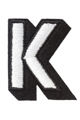 Capitol letter K of stitched with thread. Isolate on white background