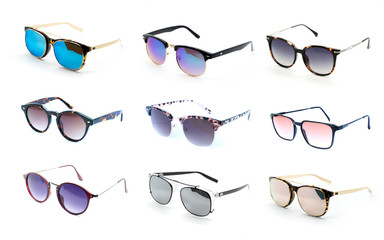 Group of beautiful sunglasses isolated on white background