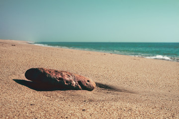 Fototapeta na wymiar sun baked, beachrock, beach sand and sea, cuban beach, isolated beach, beachsand and horizon
