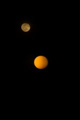 Big sun in the dark background.