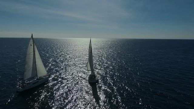 Aero shooting of two yachts in the open sea