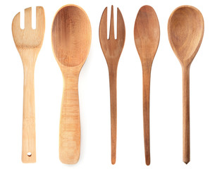 Wooden cooking utensils on white background