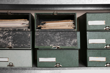 Different boxes on shelves in archive
