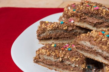 Cakes with a colorful sprinkling of stars on a white plate