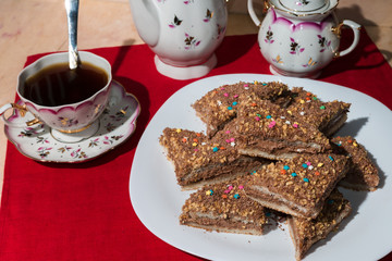 Cakes with a colorful sprinkling of stars on a white plate