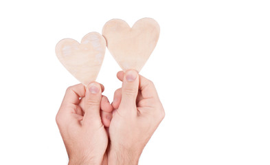 Wood heart in hand