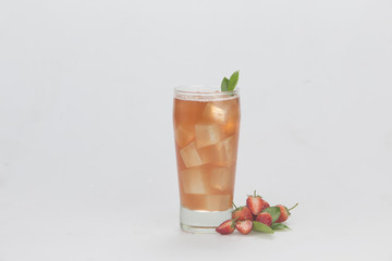 Sweet strawberry juice with white backdrop.