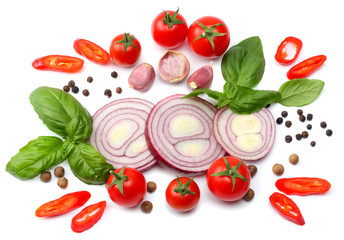 mix of slice of tomato, red onion, basil leaf, garlic and spices isolated on white background. top view