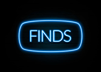 Finds  - colorful Neon Sign on brickwall