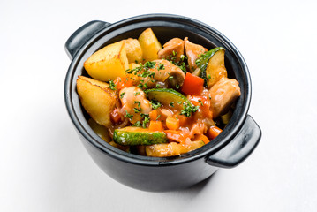 potato with meat and vegetables in the pot
